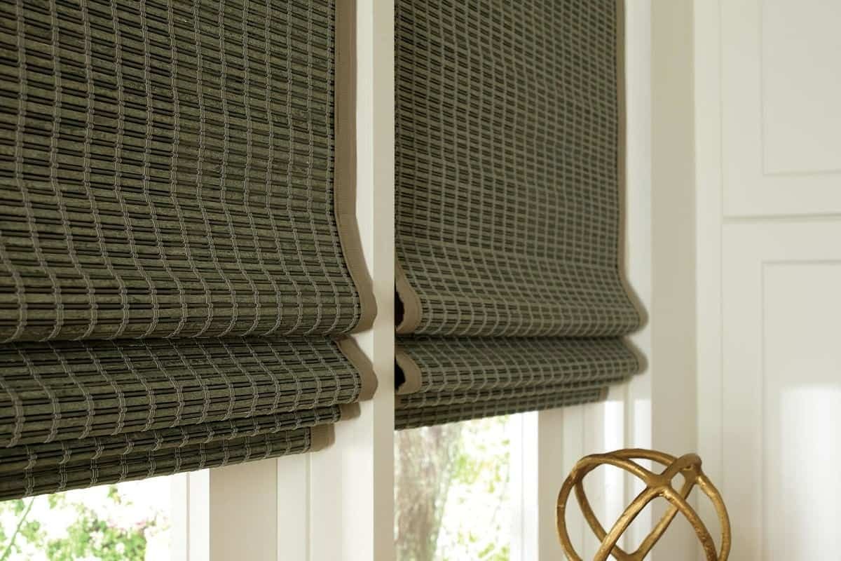 A set of Hunter Douglas Provenance® Woven Wood Shades in a window near Jackson, Wyoming (WY)